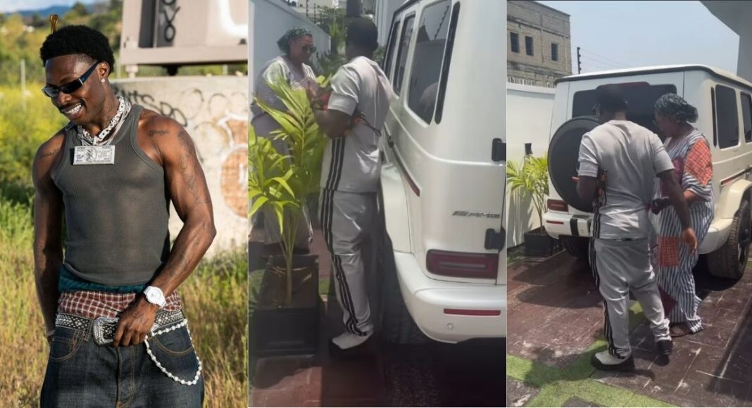 Asake hugging his mother after gifting her a white Mercedes-Benz G-Wagon for Ramadan.